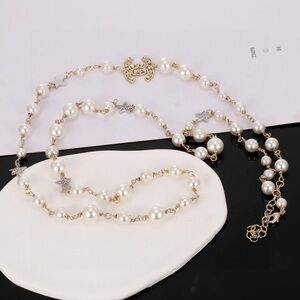 CHANEL Pearl and Gold Star Necklace